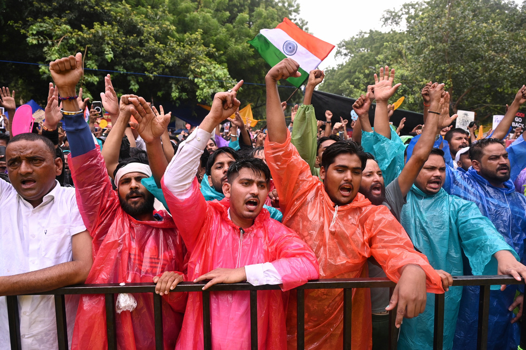 Protesters raise slogans during a demonstration demanding educational reforms as part of the Cockroach Janta Party's ongoing protest movement in New Delhi, India, Friday, July 24, 2026. (AP Photo/Vipin)