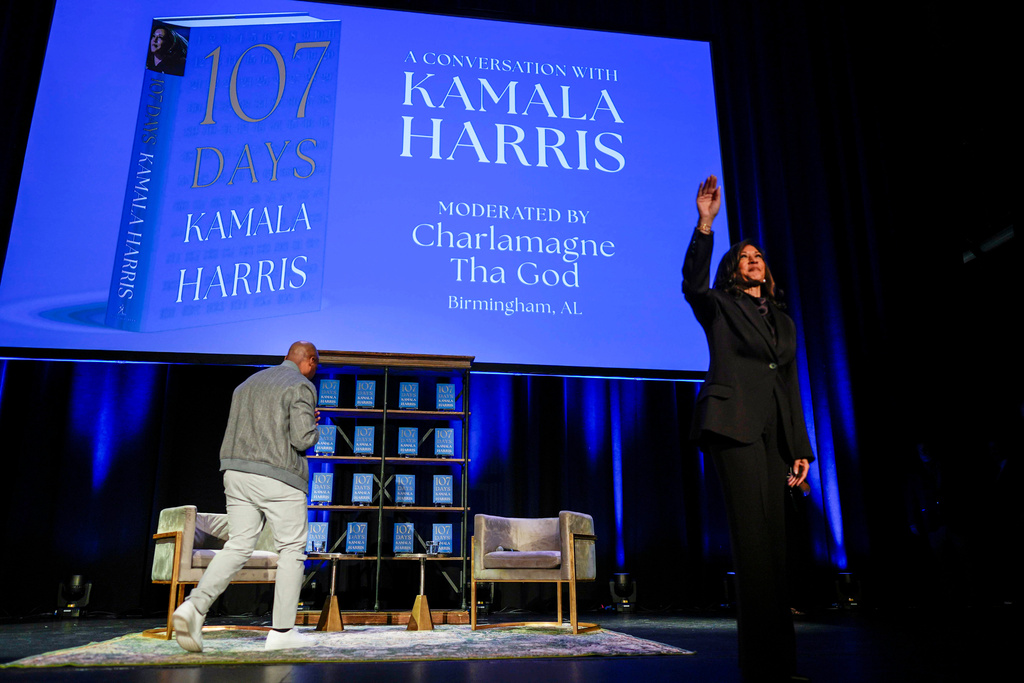 Former Vice President Kamala Harris waves to the crowd before speaking about her new book, "107 Days," during an event on Friday, Oct. 17, 2025, in Birmingham, Ala. (AP Photo/Mike Stewart)
