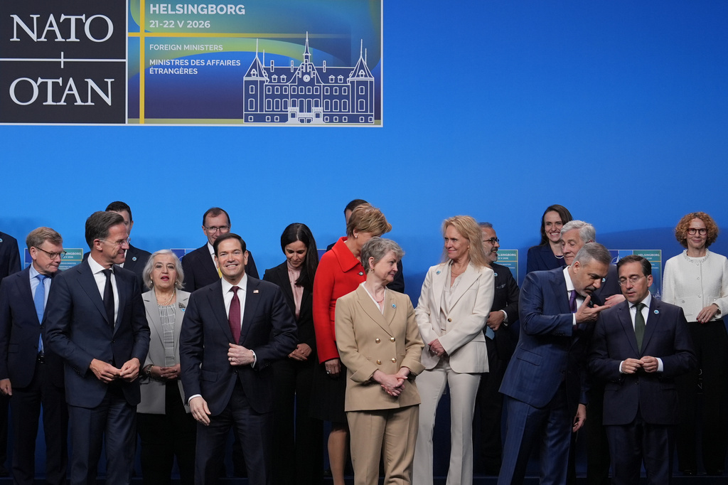 United States Secretary of State Marco Rubio, front second left, and NATO Secretary General Mark Rutte, front left, speak with each other during a group photo at a meeting of NATO foreign ministers in Helsingborg, Sweden, Friday, May 22, 2026. (AP Photo/Julia Demaree Nikhinson, Pool)