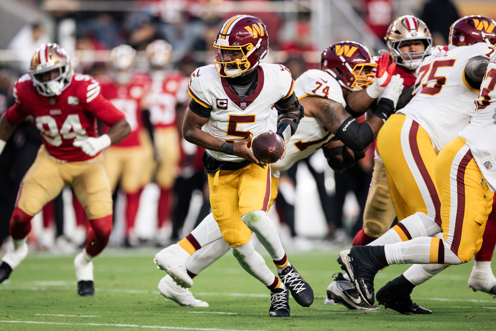 Washington Commanders quarterback Jayden Daniels (5) is seen during the second quarter of a NFL football game against the San Francisco 49ers in Santa Clara, Calif., Monday, Oct. 19, 2026. (Stephen Lam/San Francisco Chronicle via AP)