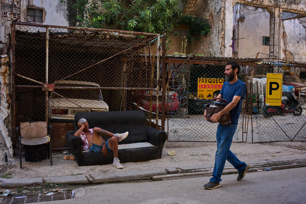 A man rests on a sofa on a street in Havana, Cuba, Thursday, Aug. 27, 2026. (AP Photo/Ramon Espinosa)