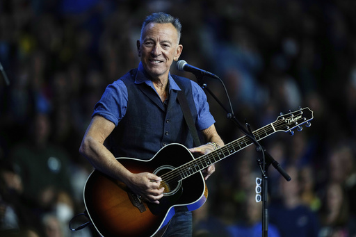 bruce springsteen all dressed up in blue Bruce Springsteen performing in a blue blazer Photo Print - Bed Bath & Beyond