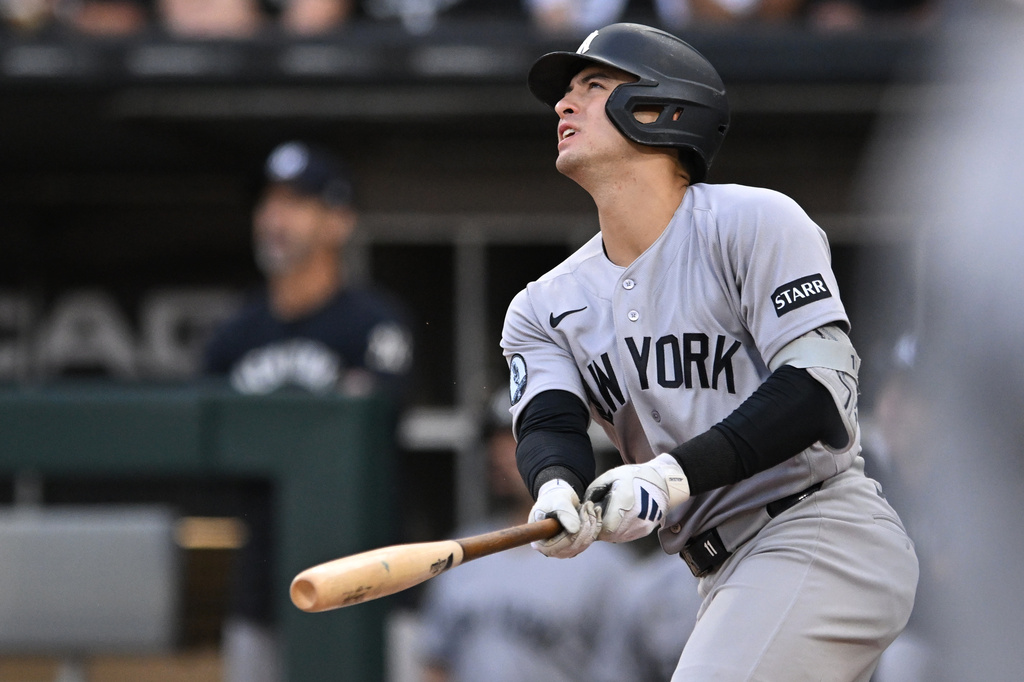 New York Yankees' Anthony Volpe watches his two-run double during the second inning of a baseball game against the Chicago White Sox in Chicago, Tuesday, July 28, 2026. (AP Photo/Paul Beaty)