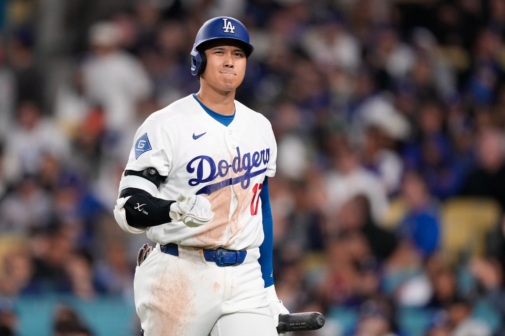 Los Angeles Dodgers' Shohei Ohtani walks away after striking out during the eighth inning of a baseball game against the Cleveland Guardians, Wednesday, April 1, 2026, in Los Angeles. (AP Photo/Mark J. Terrill)