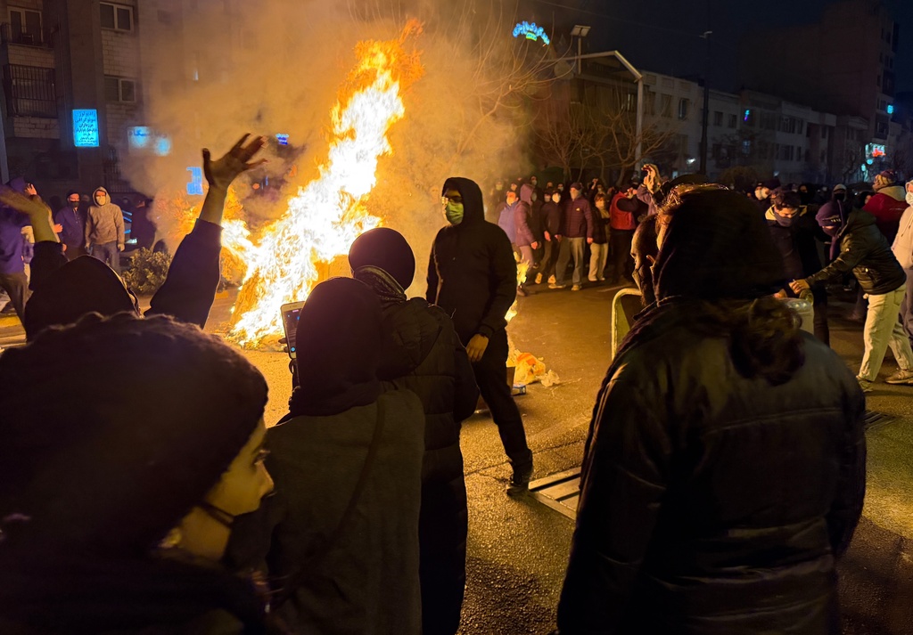 Iranians attend an anti-government protest in Tehran, Iran, Friday, Jan. 9, 2026. (AP Photo)