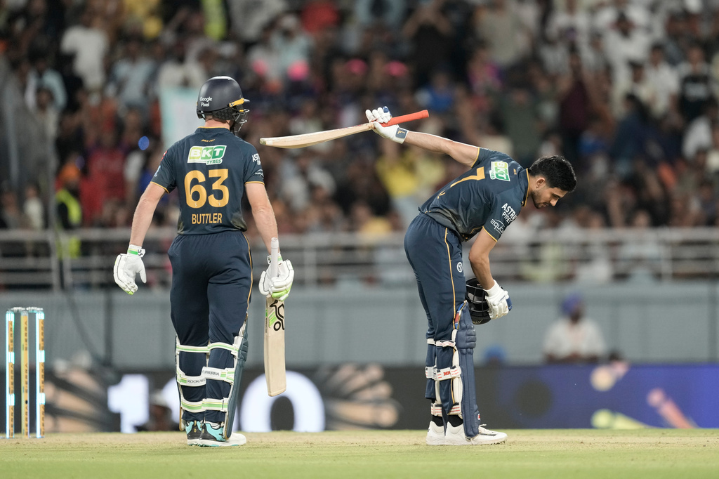 Gujarat Titans' captain Shubman Gill celebrates his century during the Indian Premier League cricket match between Gujarat Titans and Rajasthan Royals in New Chandigarh, India, Friday, May 29, 2026. (AP Photo/Ashwini Bhatia)