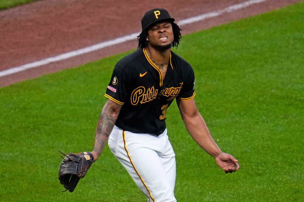 Pittsburgh Pirates pitcher Gregory Soto reacts to giving up a three-run home run to Cincinnati Reds' Eugenio Suárez during the ninth inning of a baseball game in Pittsburgh, Saturday, June 27, 2026. (AP Photo/Gene J. Puskar)