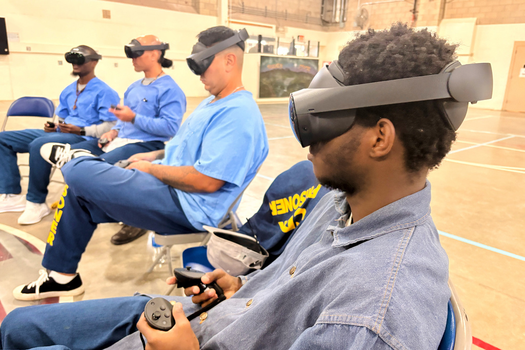 Incarcerated men use virtual reality headsets inside Valley State Prison in Chowchilla, Calif., Dec. 11, 2025. (AP Photo/Haven Daley)