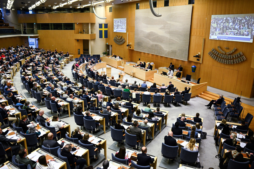 The Swedish parliament (Riksdagen) votes on new justice legislation in Stockholm, Monday, June 15, 2026. (Fredrik Sandberg/TT News Agency via AP)