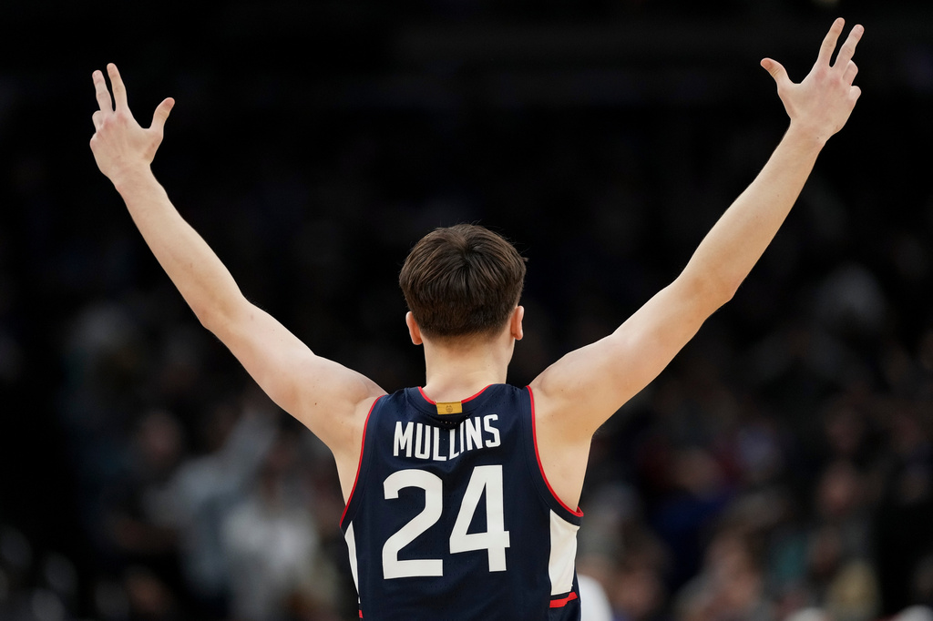 UConn guard Braylon Mullins celebrates his game-winning basket against Duke during the second half in the Elite Eight of the NCAA college basketball tournament, Sunday, March 29, 2026, in Washington. (AP Photo/Stephanie Scarbrough)