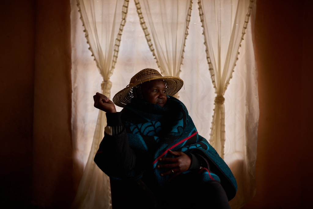 Thabang Masupha, 32, who is HIV-positive, poses for a portrait in Maputsoe, Lesotho, Thursday, July 17, 2025. Masupha, who is unemployed, says she stopped going to public health clinics after being humiliated and discriminated against multiple times by doctors and nurses for being a transgender woman. Masupha trusted only a U.S.-funded organization that specialized in health services for the LGBTQ+ community. When it shut its doors after the U.S. aid cuts, Masupha lost access to medication refills. She is rationing pills, as are some other patients in similar situations. (AP Photo/Bram Janssen)