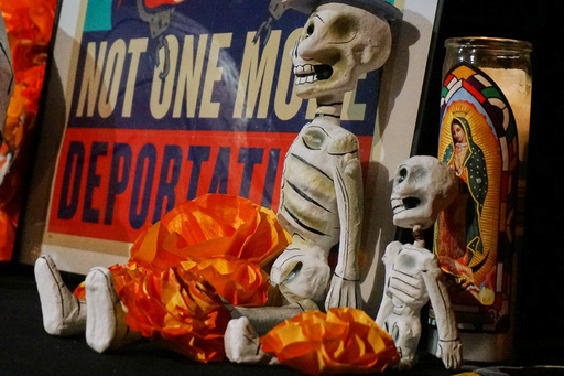 A sign protesting deportations is part of an “ofrenda” for the commemoration of Día de Muertos (Day of the Dead) at El Colegio High School in Minneapolis on Saturday, Nov. 1, 2025. (AP Photo/Giovanna Dell'Orto) A sign protesting deportations is part of an “ofrenda” for the commemoration of Día de Muertos (Day of the Dead) at El Colegio High School in Minneapolis on Saturday, Nov. 1, 2025. (AP Photo/Giovanna Dell'Orto)