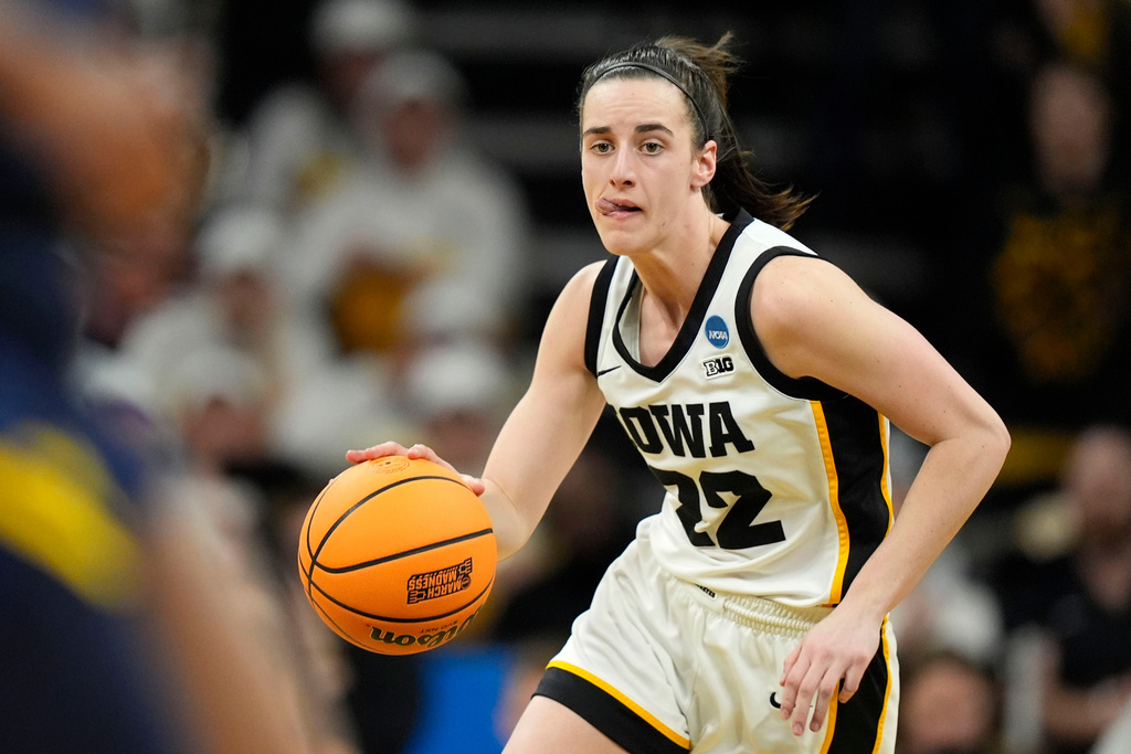 FILE - Iowa guard Caitlin Clark drives up court in the second half of a second-round college basketball game against West Virginia in the NCAA Tournament, Monday, March 25, 2024, in Iowa City, Iowa. (AP Photo/Charlie Neibergall, File)