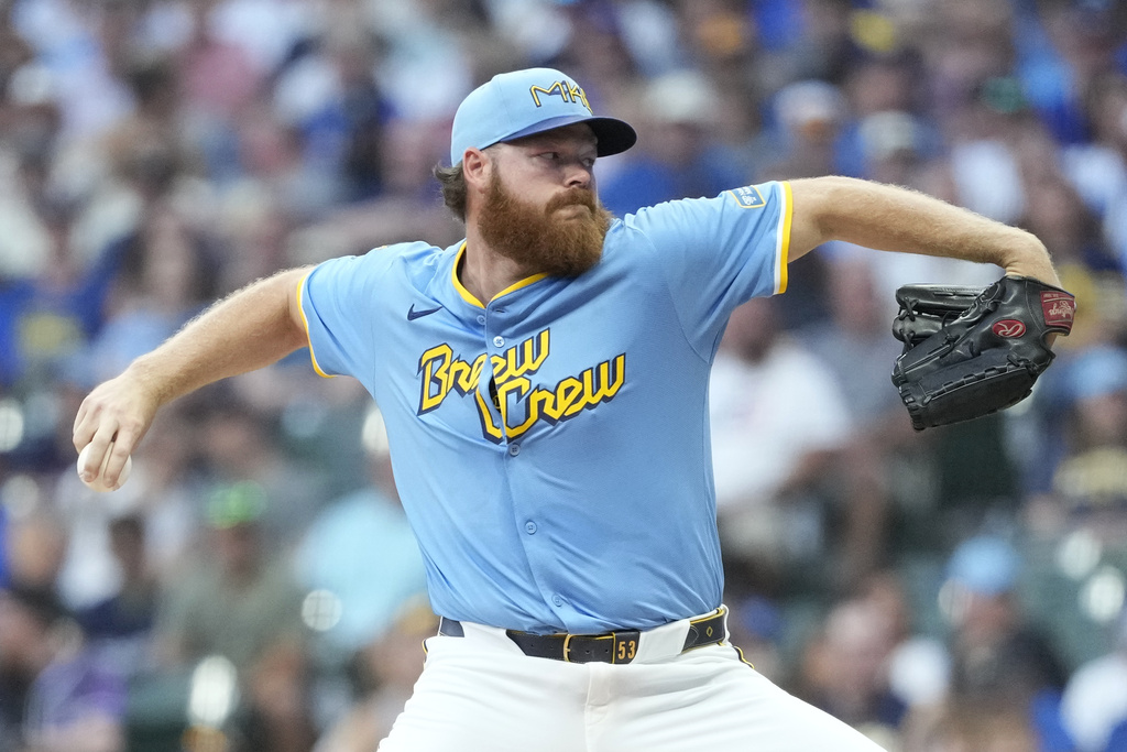 Milwaukee Brewers' Brandon Woodruff pitches during the first inning of a baseball game against the New York Mets, Friday, Aug. 8, 2025, in Milwaukee. (AP Photo/Aaron Gash)