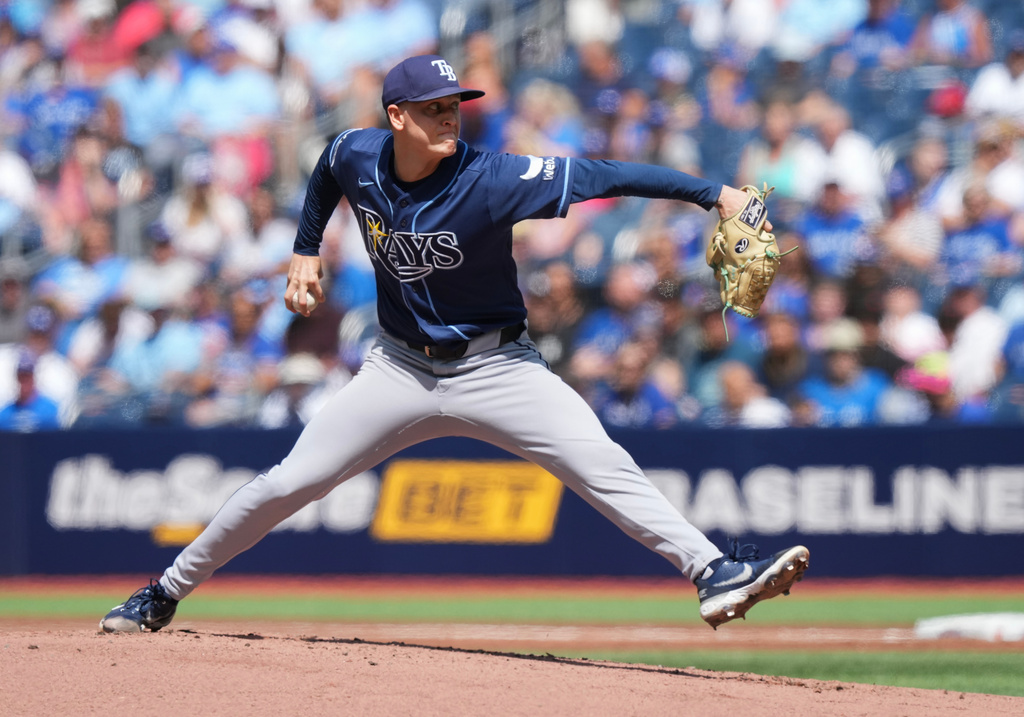 Tampa Bay Rays pitcher Casey Legumina pitches against the Toronto Blue Jays during the first inning of a baseball game in Toronto, Thursday, July 23, 2026. (Nathan Denette/The Canadian Press via AP)