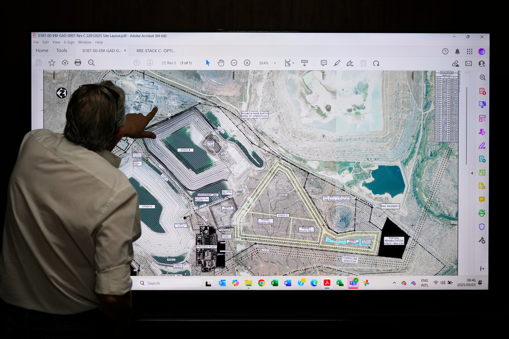 Rainbow Rare Earths project director Alberto Bruttomesso explains the company's work in Phalaborwa, South Africa, Monday, Sept. 8, 2025. (AP Photo/Themba Hadebe)