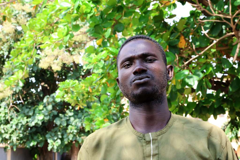 Mubarak Dahiru, a survivor of the detention, is photographed outside his house in Minna, Nigeria, Saturday, Sept. 19, 2026. (AP Photo/Afolabi Sotunde)