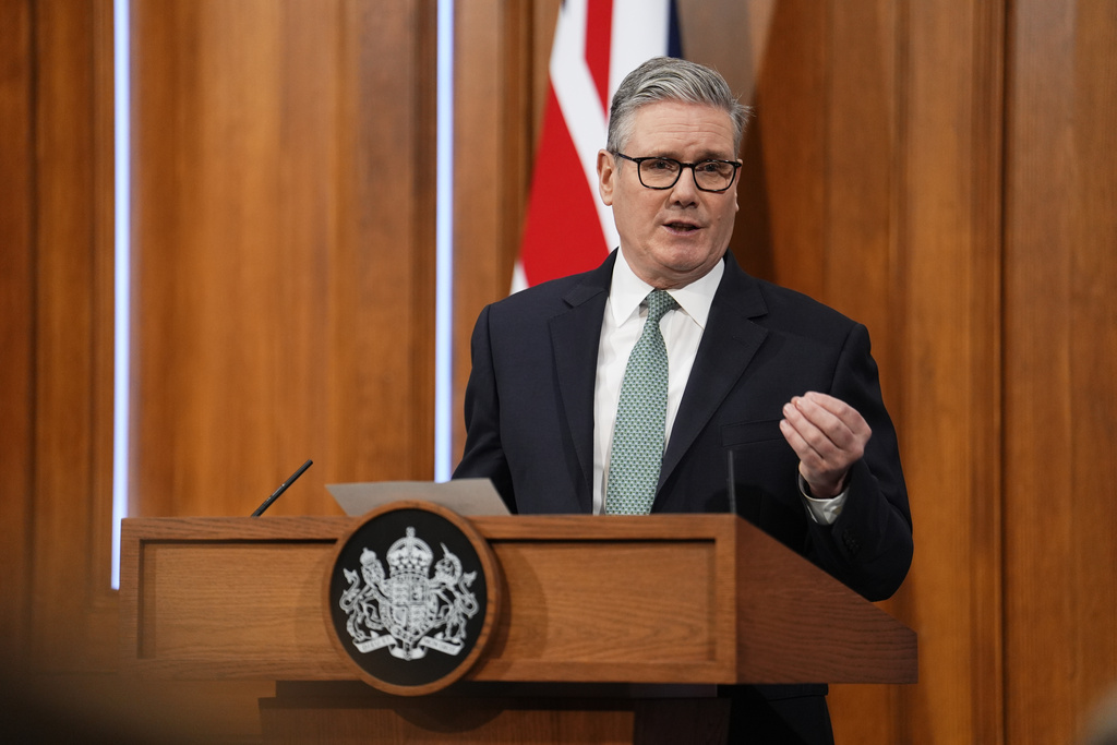 Britain's Prime Minister Keir Starmer delivers a statement in the media briefing room of 9 Downing Street, in central London, Monday, Jan. 19, 2026. (Jordan Pettitt/Pool Photo via AP)
