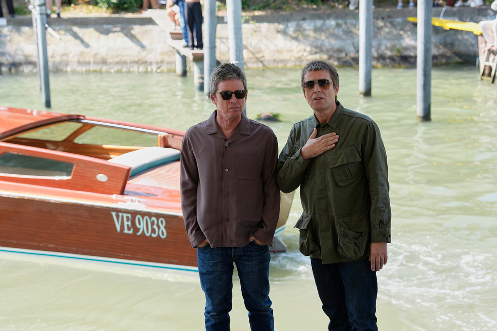Noel Gallagher, left, and Liam Gallagher arrive at the 83rd edition of the Venice Film Festival in Venice, Italy, on Saturday, Sept. 5, 2026. (Photo by Alessandra Tarantino/Invision/AP)