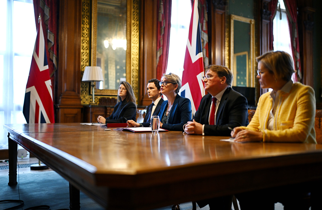 Britain's Foreign Secretary Yvette Cooper, center, speaks during a virtual summit at the Foreign & Commonwealth Office in London, on Thursday April 2, 2026, with around 35 countries to discuss ways of reopening the Strait of Hormuz. (Leon Neal/Pool Photo via AP)