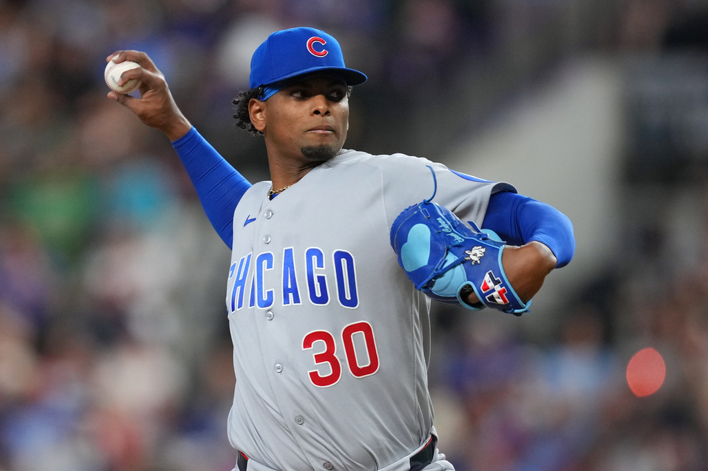 Chicago Cubs starting pitcher Edward Cabrera throws to the Texas Rangers during the second inning of a baseball game Saturday, May 9, 2026, in Arlington, Texas. (AP Photo/Julio Cortez)