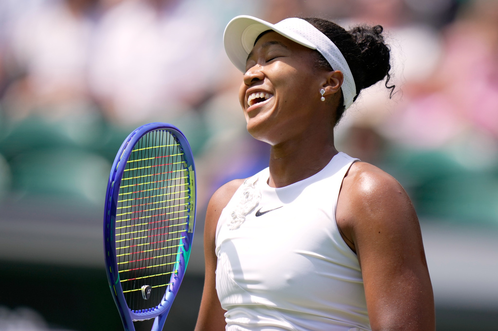 Naomi Osaka of Japan reacts during the third round women's singles match against Daria Kasatkina of Australia at the Wimbledon Tennis Championships in London, Friday, July 3, 2026.(AP Photo/Brian Inganga)