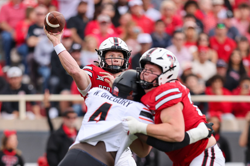 Texas Tech quarterback Will Hammond, top left, throws a pass during the first half of an NCAA college football game against Oklahoma State, Saturday, Oct. 25, 2025, in Lubbock, Texas. (AP Photo/Chase Seabolt) Texas Tech quarterback Will Hammond, top left, throws a pass during the first half of an NCAA college football game against Oklahoma State, Saturday, Oct. 25, 2025, in Lubbock, Texas. (AP Photo/Chase Seabolt)