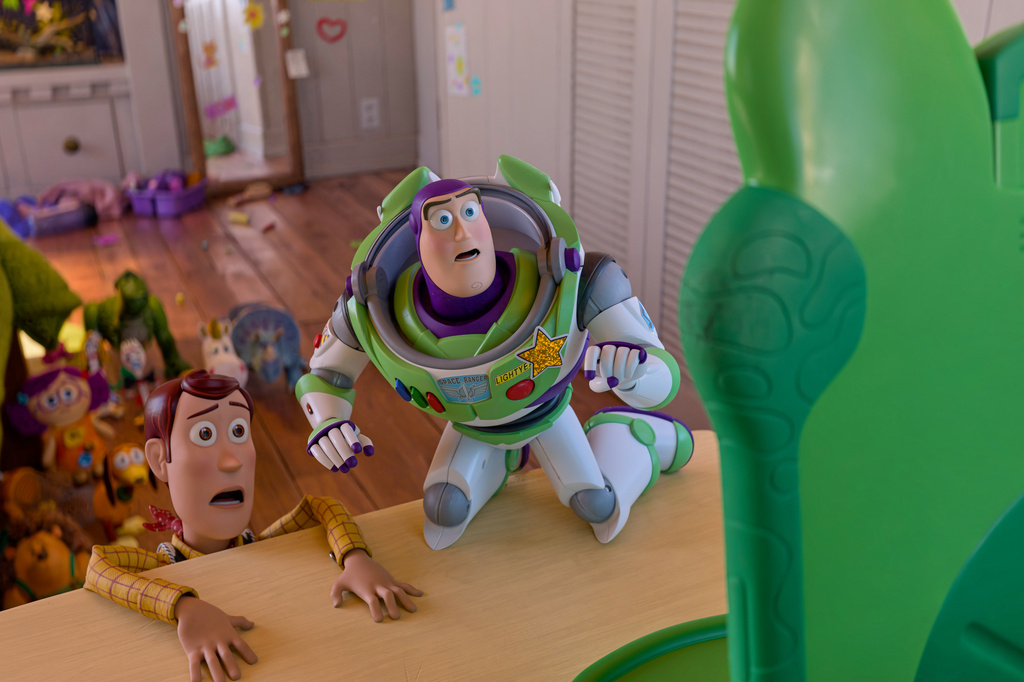 This image released by Disney shows characters Woody, voiced by Tom Hanks, left, and Buzz Lightyear, voiced by Tim Allen, in Disney and Pixar's "Toy Story 5." (Disney/Pixar via AP)