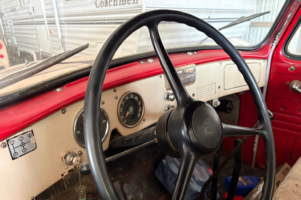 The cab interior of a 1956 International Harvester S-130 pickup truck is shown in Mason, Ill., Sunday, May 24, 2026. (AP Photo/Holly Meyer)