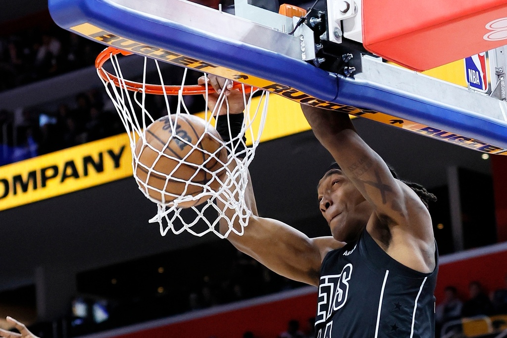 Brooklyn Nets guard Terance Mann dunks the ball against the Detroit Pistons during the first half of an NBA basketball game, Sunday, Feb. 1, 2026, in Detroit. (AP Photo/Duane Burleson)
