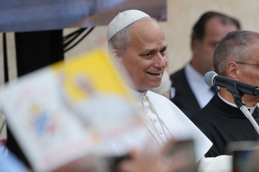 Pope Leo XIV visits the parish complex of Sacro Cuore di Gesu on the outskirts of Rome, Sunday, March 15, 2026. (AP Photo/Andrew Medichini)