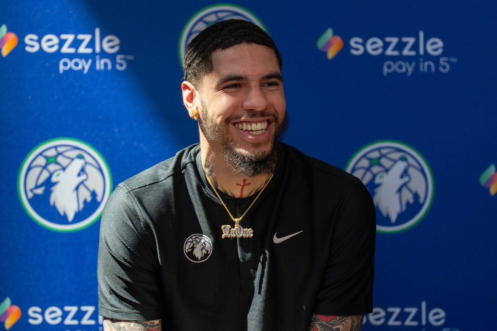 Minnesota Timberwolves newly-acquired point guard LaMelo Ball laughs during an introductory press conference at the Target Center in Minneapolis on Tuesday, July 14, 2026. (Alex Kormann/Minnesota Star Tribune via AP)