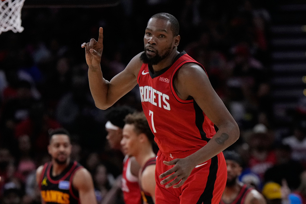 Houston Rockets forward Kevin Durant celebrates after making a shot during the first half of an NBA basketball game against the Atlanta Hawks in Houston, Friday, March 20, 2026. (AP Photo/Ashley Landis)