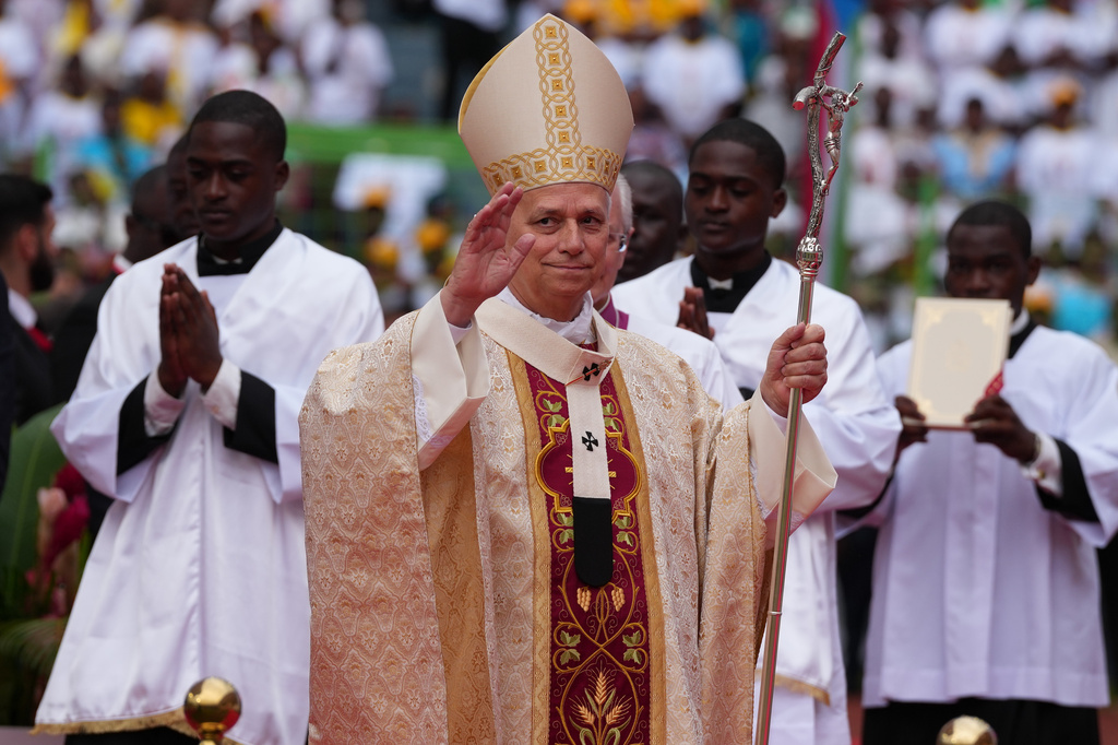 Pope Leo XIV arrives to celebrate the Holy mass at the Malabo stadium, in Malabo, Equatorial Guinea, Thursday, April 23, 2026, on the last day of his 11-day pastoral visit to Africa. (AP Photo/Misper Apawu)