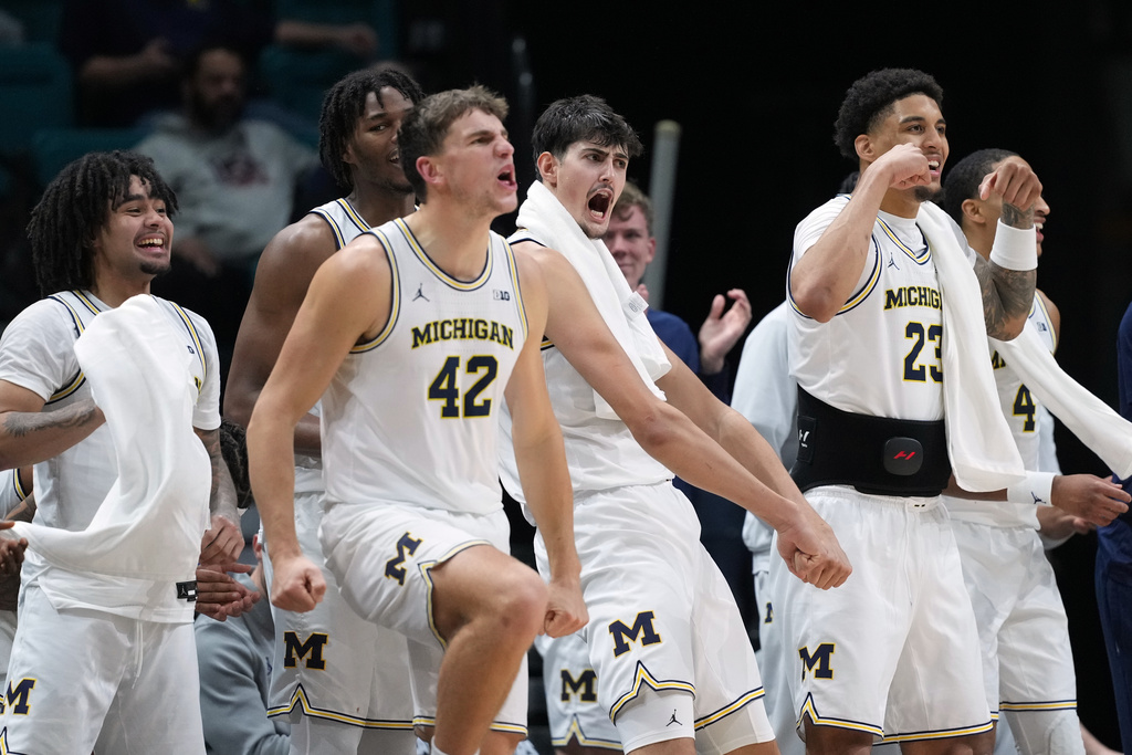 Michigan celebrates as they defeat Gonzaga in an NCAA college basketball game in the Players Era tournament in Las Vegas, Wednesday, Nov. 26, 2025. (AP Photo/Eric Gay)