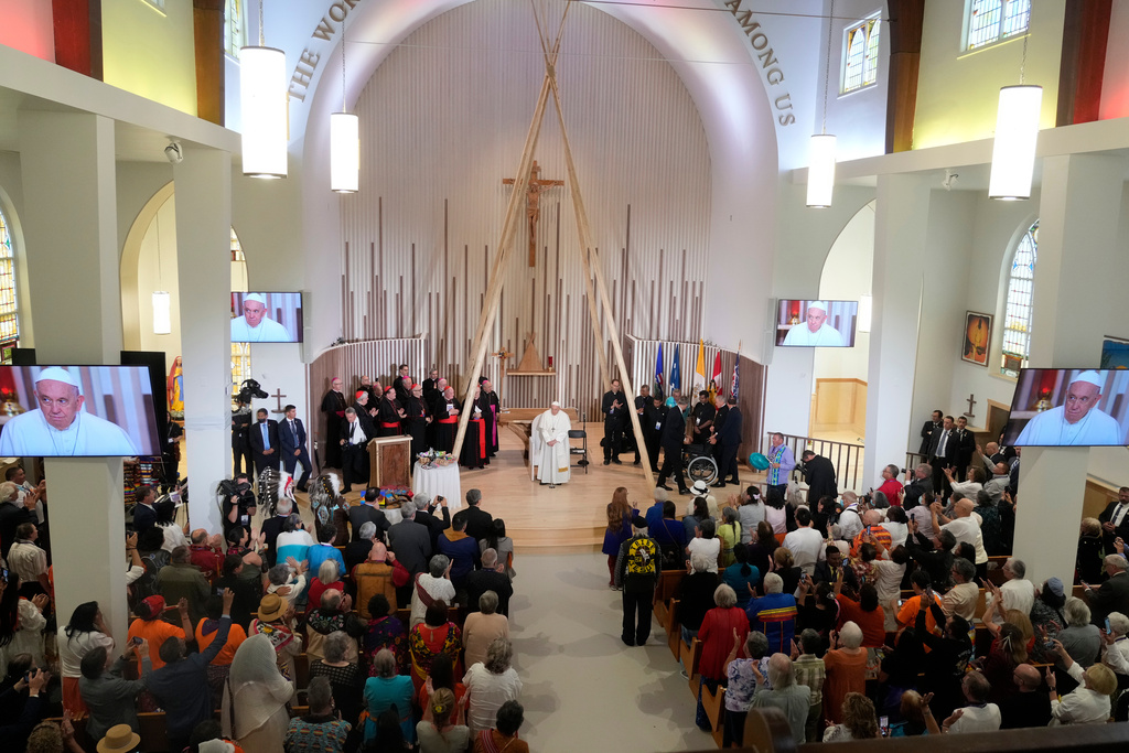 FILE - Pope Francis arrives for a meeting with Indigenous peoples and members of the parish community of Sacred Heart in Edmonton, Canada, Monday, July 25, 2022. (AP Photo/Gregorio Borgia, File)