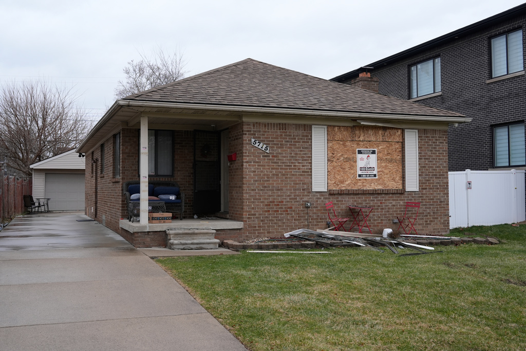The exterior the home of Ayman Mohamad Ghazali is shown in Friday, March 13, 2026, in Dearborn Heights, Mich. (AP Photo/Paul Sancya)
