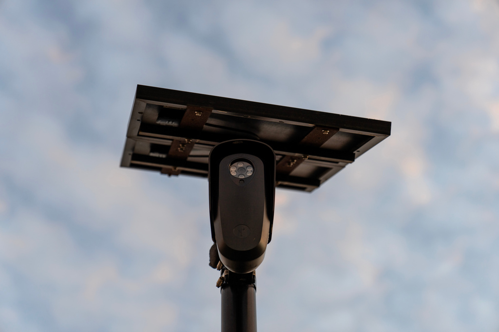 FILE - A Flock Safety license plate reader is seen along a public road, Thursday, Oct. 16, 2025, in Houston. (AP Photo/David Goldman, File)