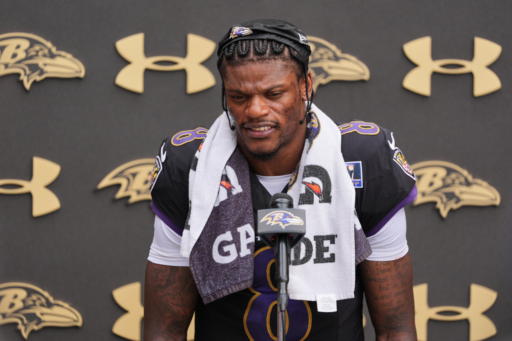 Baltimore Ravens quarterback Lamar Jackson speaks during a press conference following the team's NFL football joint training camp with the Washington Commanders, Wednesday, Aug. 26, 2026, in Owings Mills, Md. (AP Photo/Stephanie Scarbrough)