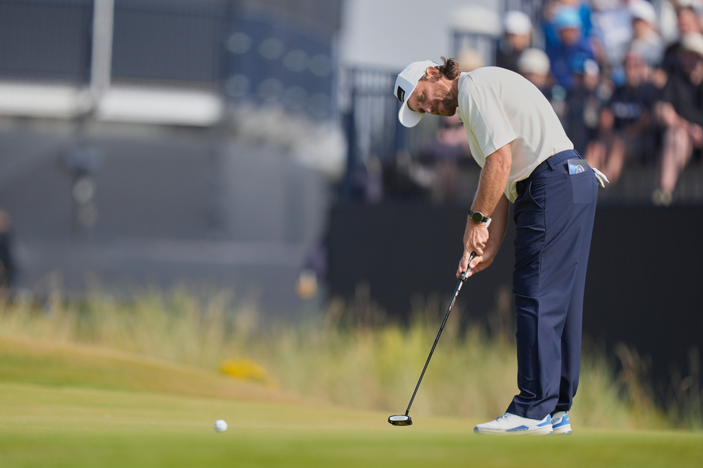 Tommy Fleetwood of England putts on the 9th green during the third day of the British Open Golf championships at Royal Birkdale golf club, in Southport, England, Saturday, July 18, 2026. (AP Photo/David Goldman)