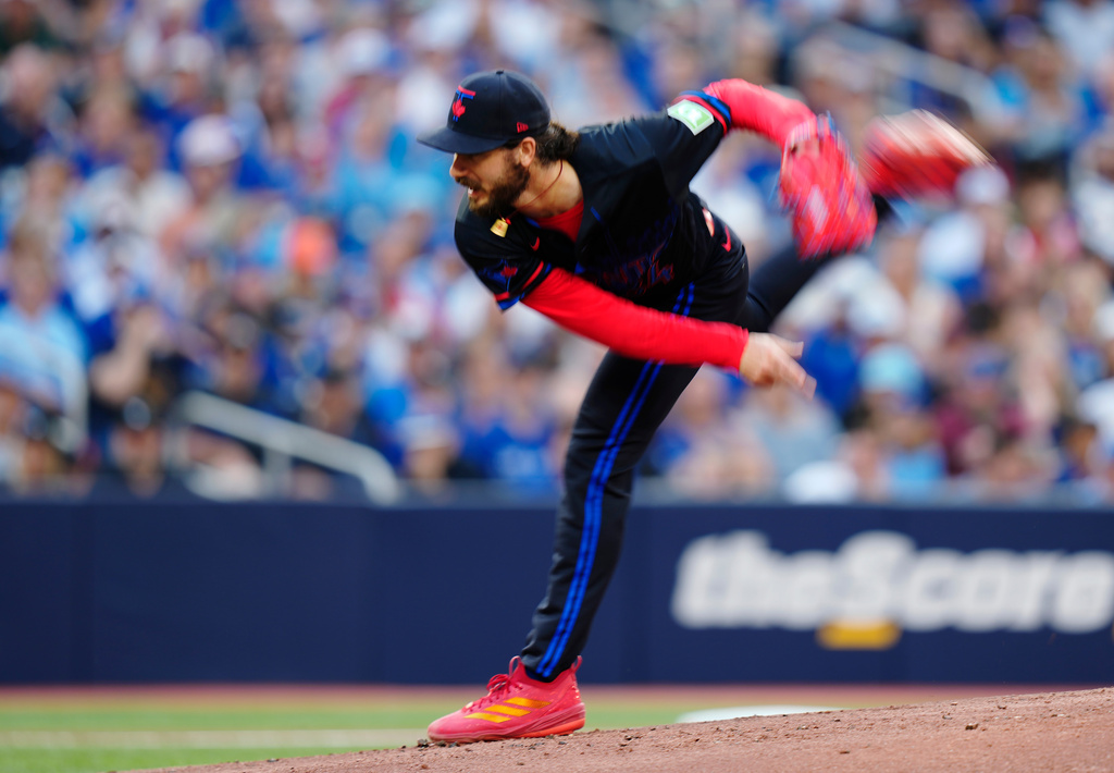 Toronto Blue Jays pitcher Dylan Cease (84) works against the St. Louis Cardinals during the first inning of a baseball game against the St. Louis Cardinals in Toronto, Friday, July 31, 2026. (Chris Young/The Canadian Press via AP)