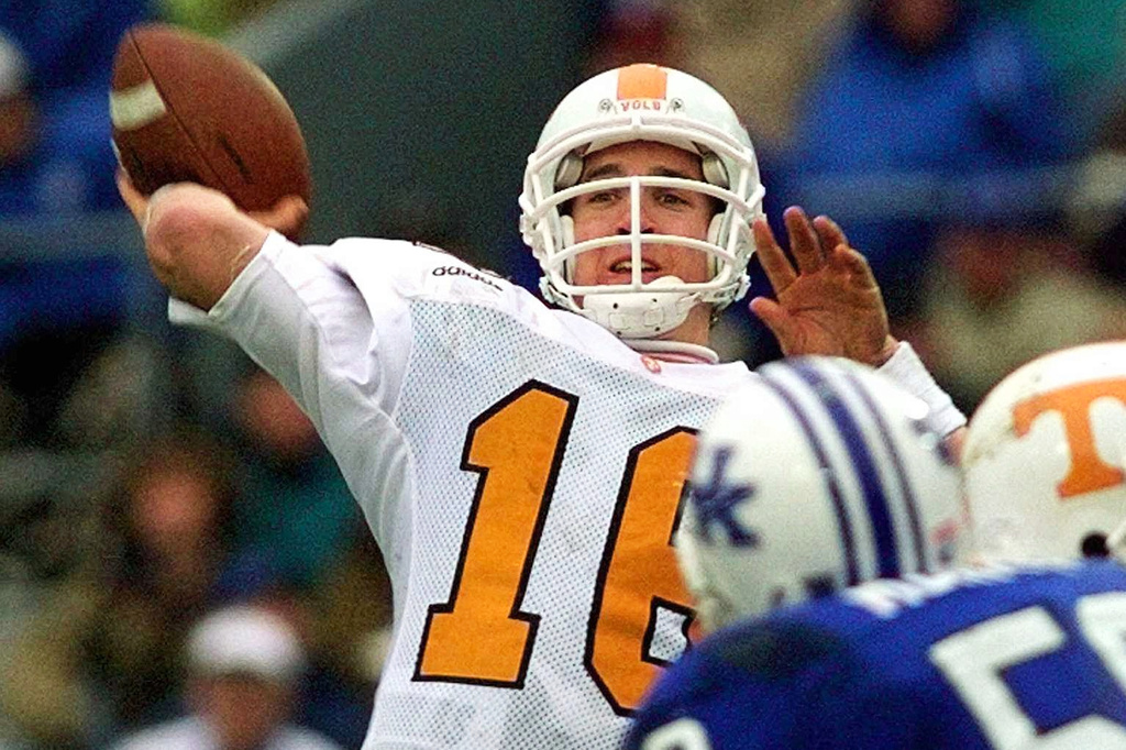FILE - Tennessee quarterback Peyton Manning launches a pass during the second half an NCAA college football game against Kentucky in Lexington, Ky., Nov. 22, 1997. (AP Photo/Ed Reinke, File)