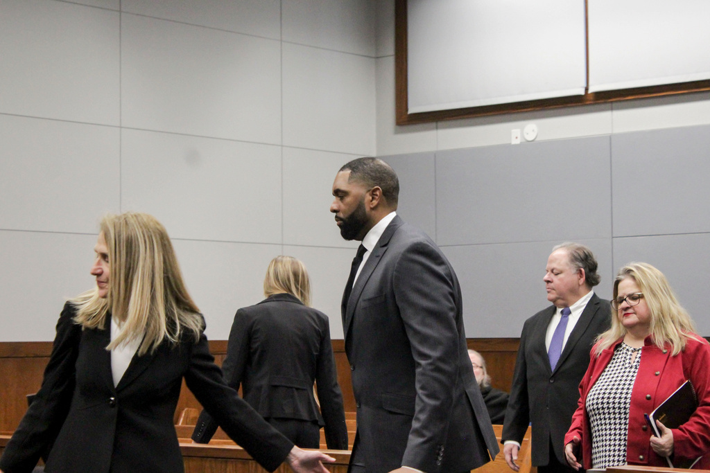 Sherrone Moore appears with his attorney, Ellen Michaels arrive for a hearing, Friday, March 6 2026, at Washtenaw County 14A-1 District in Ann Arbor, Mich. (Jordyn Pair/Ann Arbor News via AP)