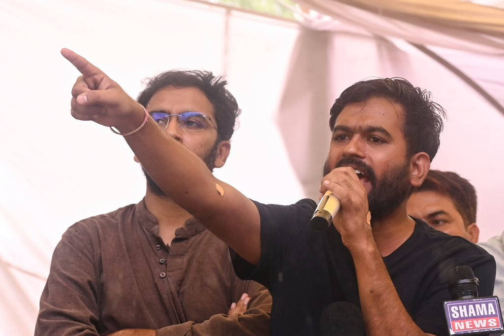 Abhijeet Dipke, founder of the Cockroach Janta Party, speaks during a demonstration demanding educational reforms as part of the party's ongoing protest movement in New Delhi, India, Friday, July 24, 2026. (AP Photo/Vipin)