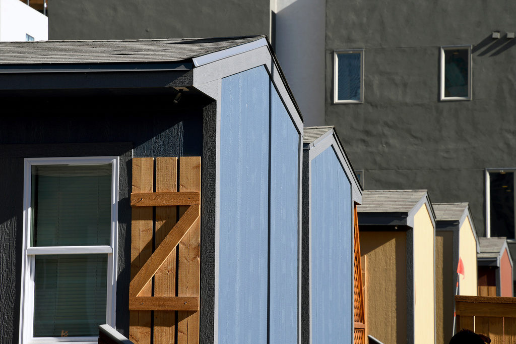 FILE - Cabin-like tiny homes are seen at a micro community in Denver on June 5, 2024. (AP Photo/Thomas Peipert, File)