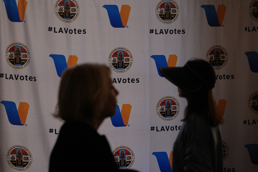 Voters walk inside a polling station on Tuesday, Nov. 4, 2025, in Beverly Hills, Calif. (AP Photo/Jae C. Hong)