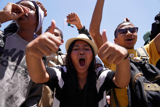 Shaniah Rakotohania, 18-year-old university student at Lycee Technique Alarabia, gestures during a protest calling for President Andry Rajoelina to step down in Antananarivo, Madagascar, Tuesday, Oct. 14, 2025. (AP Photo/Brian Inganga) Shaniah Rakotohania, 18-year-old university student at Lycee Technique Alarabia, gestures during a protest calling for President Andry Rajoelina to step down in Antananarivo, Madagascar, Tuesday, Oct. 14, 2025. (AP Photo/Brian Inganga)
