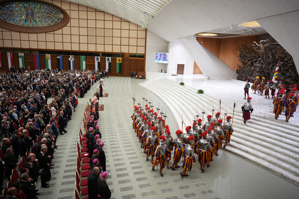 New Pontifical Swiss Guards attend a swearing-in ceremony in the Paul VI Hall at the Vatican, Wednesday, May 6, 2026. (AP Photo/Andrew Medichini)