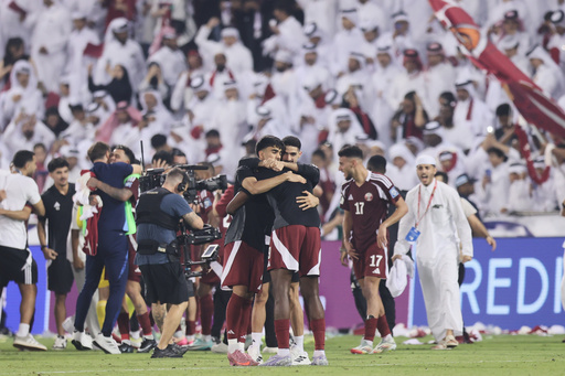 Qatar players celebrate they win against United Arab Emirates after the end of the 2026 World Cup qualifying soccer match between Qatar and United Arab Emirates at the Hamad Bin Jassim Stadium in Doha, Tuesday, Oct. 14, 2025. (AP Photo/Hussein Sayed) Qatar players celebrate they win against United Arab Emirates after the end of the 2026 World Cup qualifying soccer match between Qatar and United Arab Emirates at the Hamad Bin Jassim Stadium in Doha, Tuesday, Oct. 14, 2025. (AP Photo/Hussein Sayed)