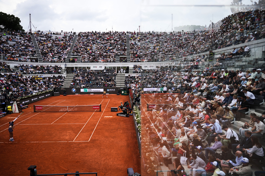 Croatia's Dino Prizmic, left, serves the ball to Serbia's Novak Djokovic during their match at the Italian Open tennis tournament, in Rome, Friday, May 8, 2026. (AP Photo/Andrew Medichini)